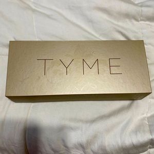 TYME 2-in-1 curling iron and straightner